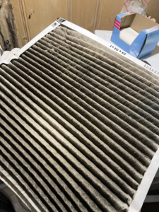 A very dirty HVAC air filter needing replacement by Evans Heat & Air in Ruther Glen, VA.