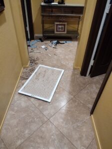 A dirty HVAC air filter removed for replacement during maintenance by Service Experts Phoenix in Phoenix, AZ.