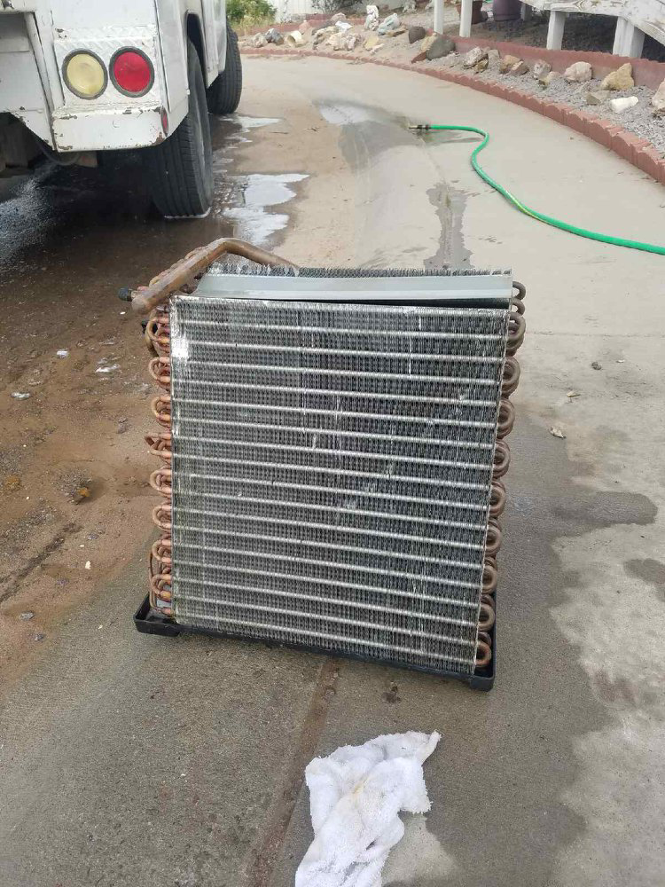 A dirty HVAC evaporator coil removed for cleaning or replacement by Avallone Mechanical Company in Las Cruces, NM.