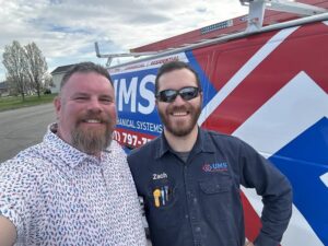 A close-up of a dirty and corroded HVAC component, indicating a need for repair by Utah Mechanical Systems in South Ogden, UT.