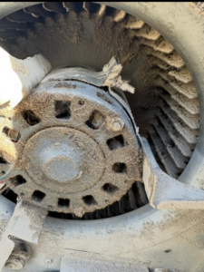 A close-up of a very dirty HVAC fan motor, indicating the need for maintenance from Best Heat & Air in Tacoma, WA.