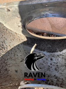 The dirty interior pan of an HVAC unit requiring cleaning by Raven Heating & Cooling in El Paso, TX.