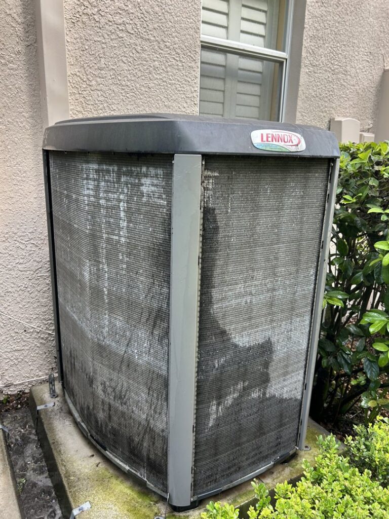 A dirty Lennox outdoor AC unit in need of cleaning or maintenance from Air Support Cooling and Heating, LLC in Tampa, FL