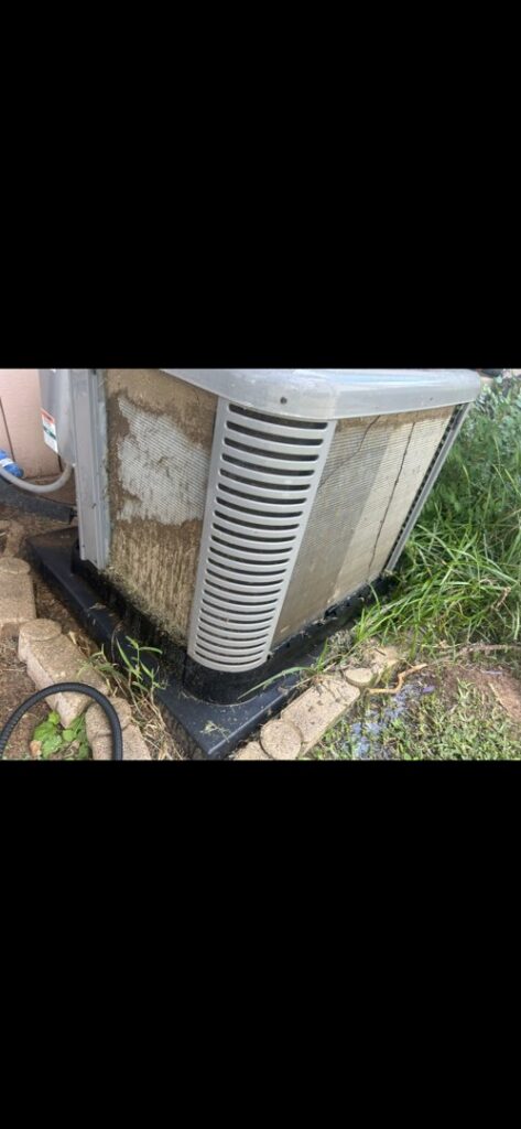 A dirty outdoor AC unit requiring maintenance, a service provided by Air Advisors of Louisiana in Shreveport, LA.