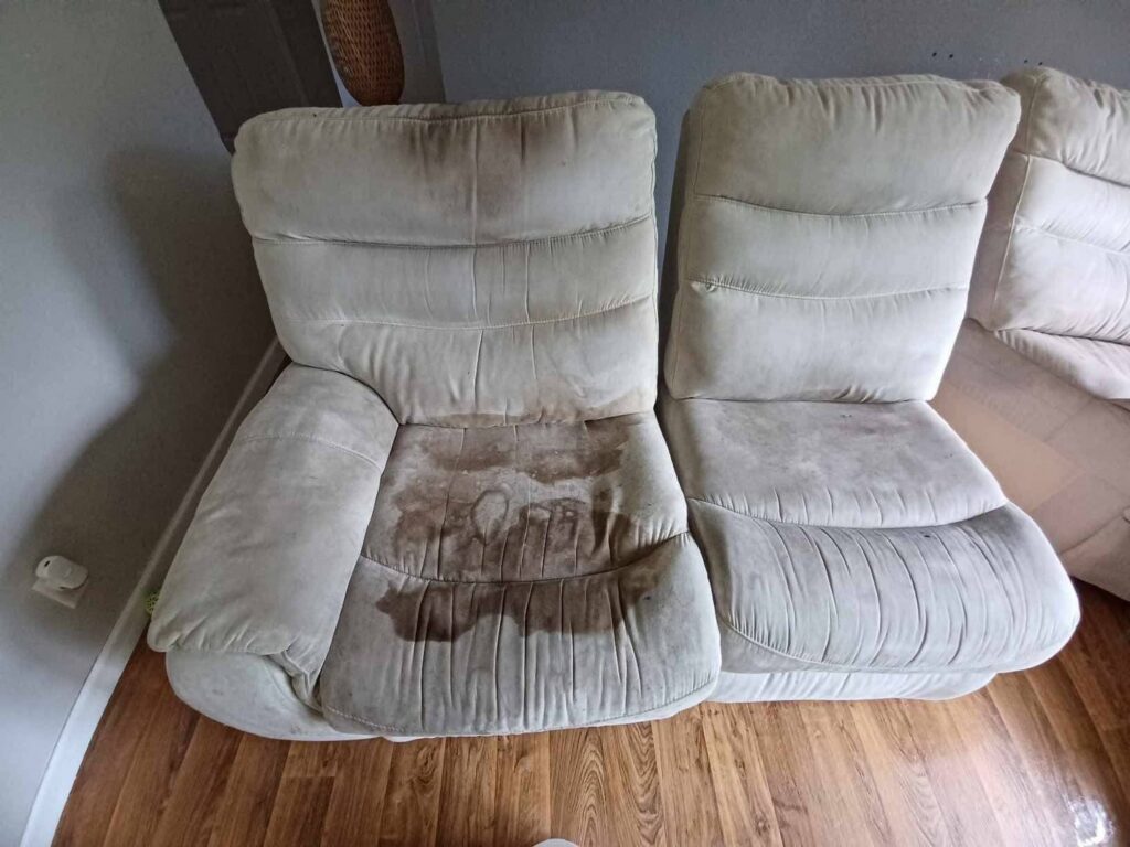 Two dirty recliner chairs showing stains before professional upholstery cleaning by Central California King of Clean LLC in Bakersfield, CA.