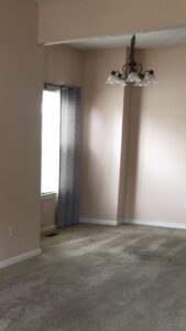 A dirty residential carpet in an empty room, ready for professional cleaning by Eco Carpet Cleaning in Indianapolis, IN.