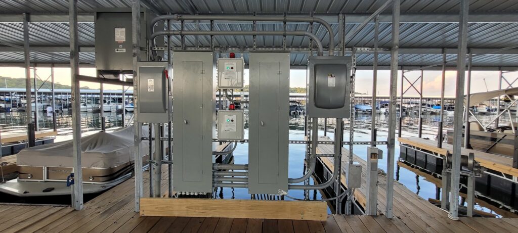 Electrical panel and conduit installation on a boat dock by Omilian Electric Inc. in Murfreesboro, TN