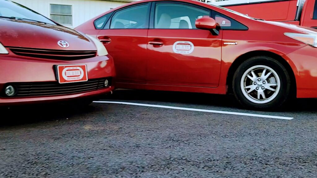 Dominion Pest Control LLC company cars parked, ready to serve clients in Lancaster & York, PA.
