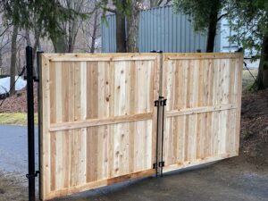 Large double wooden privacy gates providing security and style from Flanagan Fencing in Brookfield, CT.