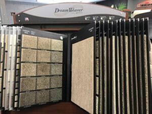 An open book display of DreamWeaver carpet samples in the showroom of BK The Floor Store of Nebraska in Columbus, NE.