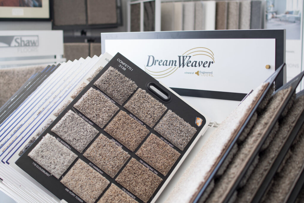 A close-up view of DreamWeaver brand carpet samples at Carpet King Interiors / Abbey Carpet & Floor in Fernley, NV.