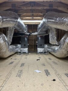 Dual HVAC furnace and air handler system with extensive ductwork installed by Brad Emberton's HVAC in Owensboro, KY.
