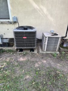 Two indoor HVAC furnace units with ductwork, installed or serviced by Carpenter Mechanical in Columbus, OH.