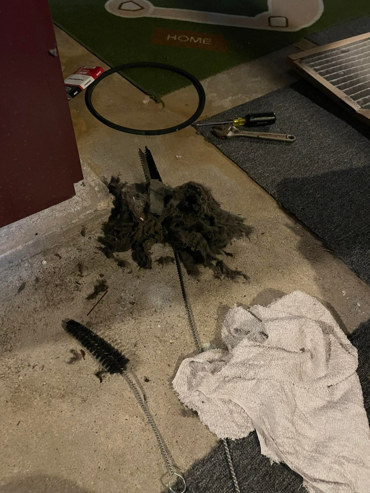 Debris and tools from a duct cleaning service by Aaron Hamilton Heating in Brunswick, ME.