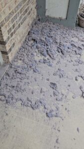 A large pile of lint and debris removed during duct cleaning by Naranjo Heating & Cooling Specialist Inc. in Joliet, IL.
