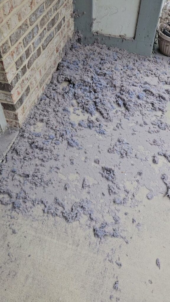 A large pile of lint and debris removed during duct cleaning by Naranjo Heating & Cooling Specialist Inc. in Joliet, IL.