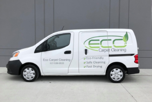A white Eco Carpet Cleaning service van with logo and services listed, ready for jobs in Indianapolis, IN.