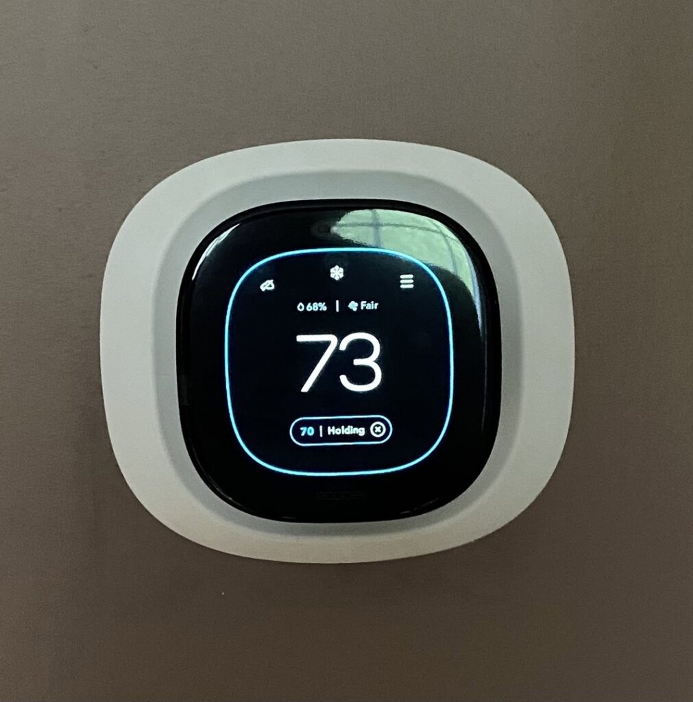 A modern Ecobee smart thermostat displaying 73 degrees, installed by JK Mechanical in Willow Street, PA.