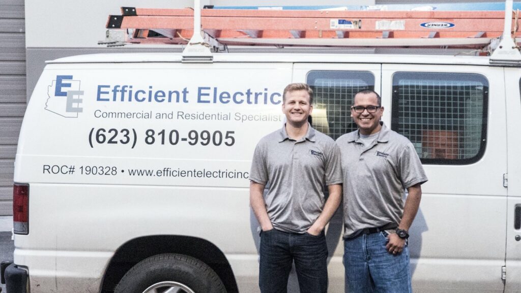 The Efficient Electric team standing proudly in front of their service van in Canton, MI.