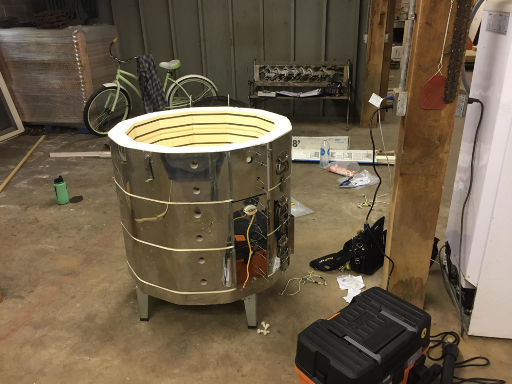 An electric kiln being assembled and wired for service by Electric Rivers in Athens, GA