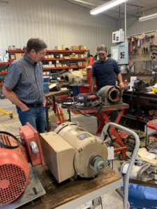Two electricians performing electric motor repair and service at Freddie's Electric Motor in Huron, SD