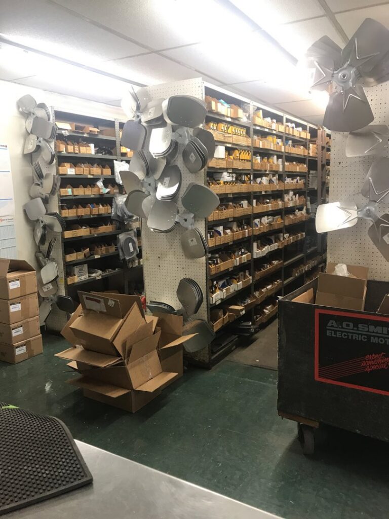 A detailed view of electric motor stator windings, indicating repair or maintenance by Caddell Electric Co Inc in Dallas, TX