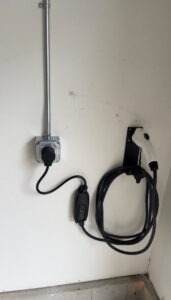 An electric vehicle (EV) charging station professionally installed by Josh LaFerriere Electric in Westbrook, ME.