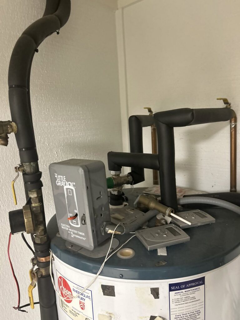 Electric water heater with an electrical timer installed by Alternate Energy Inc. in Pearl City, HI.