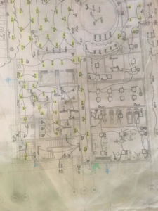 A detailed electrical blueprint or wiring diagram for a building project by Shines Electric in Orlando, FL.