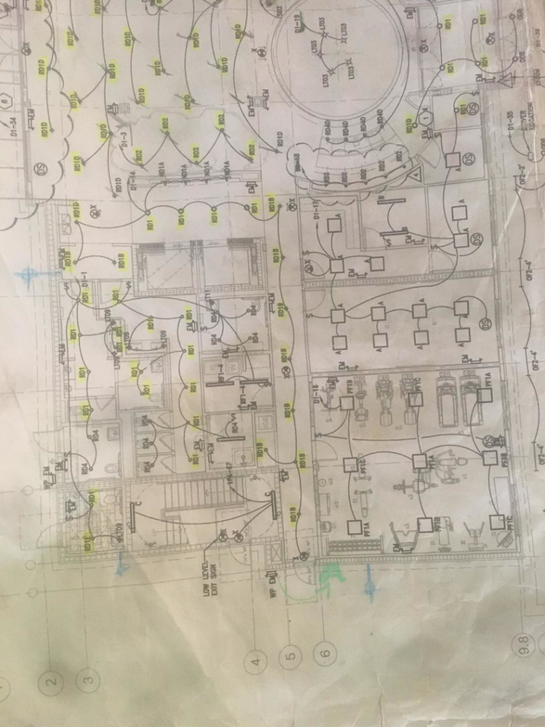 A detailed electrical blueprint or wiring diagram for a building project by Shines Electric in Orlando, FL.