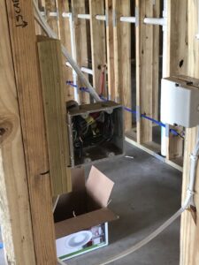 An electrical box with wires during the rough-in phase of a new construction project by TCB Electric LLC in Elizabethtown, KY.