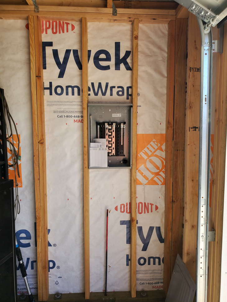 A new electrical breaker panel installed on a wall by B&C Electric LLC in Bakersfield, CA