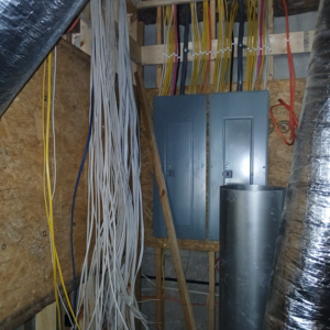 Essential Electric LLC installing electrical breaker panels and wiring bundles for a project in Lancaster, KY.