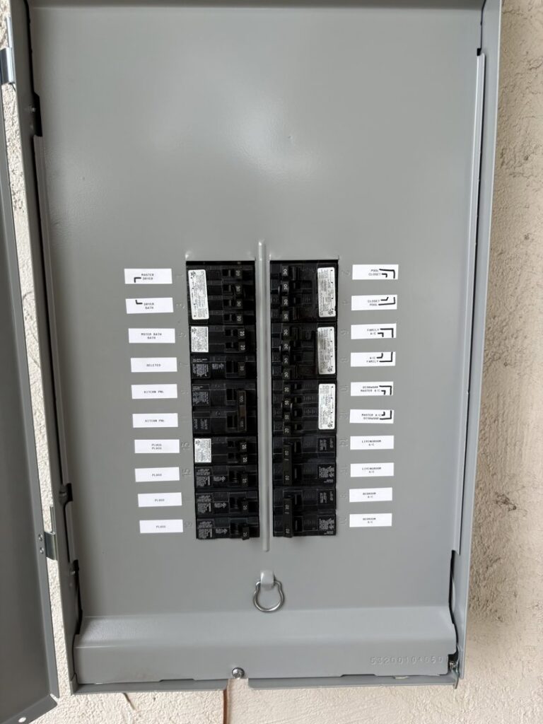 An open electrical breaker panel with clearly labeled circuits, indicating an upgrade or service by Big Red Electric Company in San Antonio, TX.