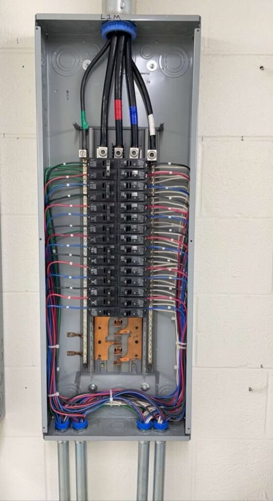Neatly wired electrical breaker panel installation by Trizone Electric, LLC in Houston, TX.