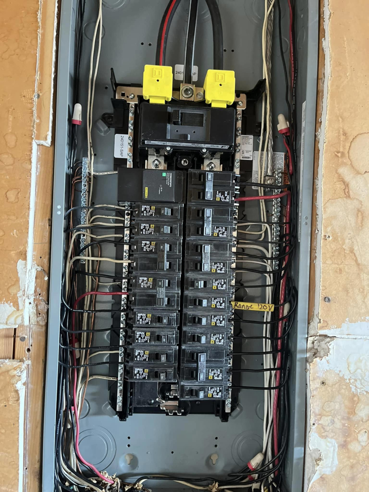 Detailed view of an electrical breaker panel wiring by One Electric LLC in Idaho Falls, ID