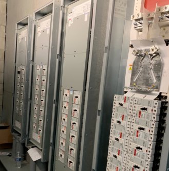 Electrical breaker panels and wiring installed in a commercial building by Tri-Area Electrical Construction in Cape Coral, FL.