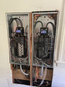 Two electrical breaker panels with extensive wiring installed by C. C. Taylor Electric LLC in Powhatan, VA.