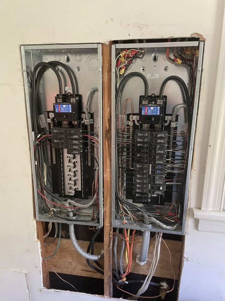 Two electrical breaker panels with extensive wiring installed by C. C. Taylor Electric LLC in Powhatan, VA.