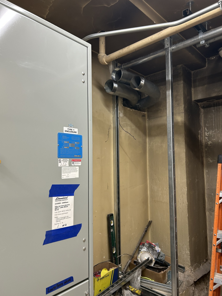 Electrical conduit installation next to a panel by City Service Electric, Inc. in Rolling Meadows, IL