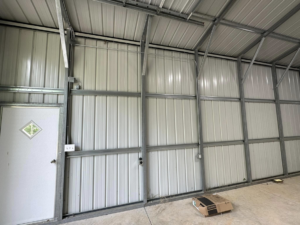 Electrical conduit and box installation inside a metal building by Current Solutions Electric in Boca Raton, FL