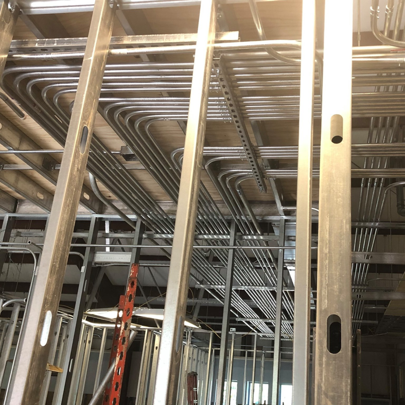 Electrical conduits expertly installed in a commercial building ceiling by Eastmont Electric Company, Inc. in Montgomery, AL.