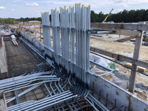 Electrical conduit installation at a construction site by Steve Thomson Electric in Fort Worth, TX.