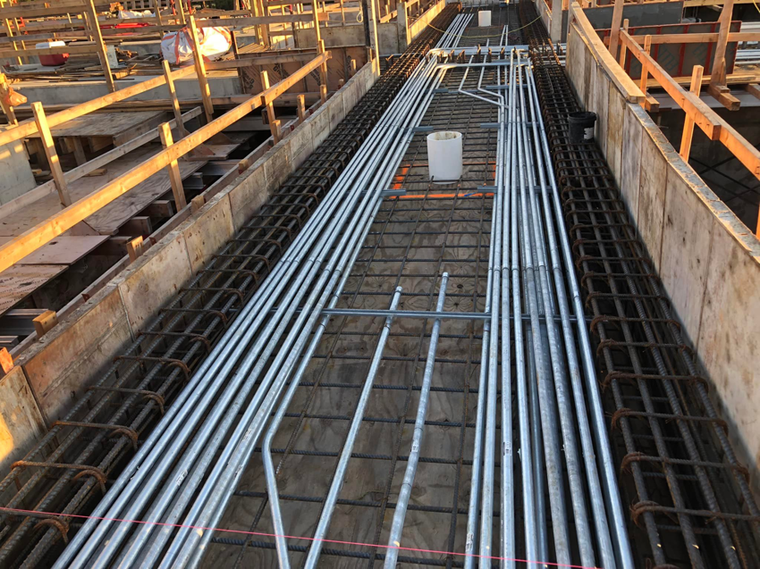 Extensive electrical conduit layout on a commercial construction site by Steve Thomson Electric in Fort Worth, TX.