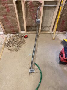 Electrical conduit and junction boxes installed during a rough-in phase by Signature Electric INC. in Cleveland, OH