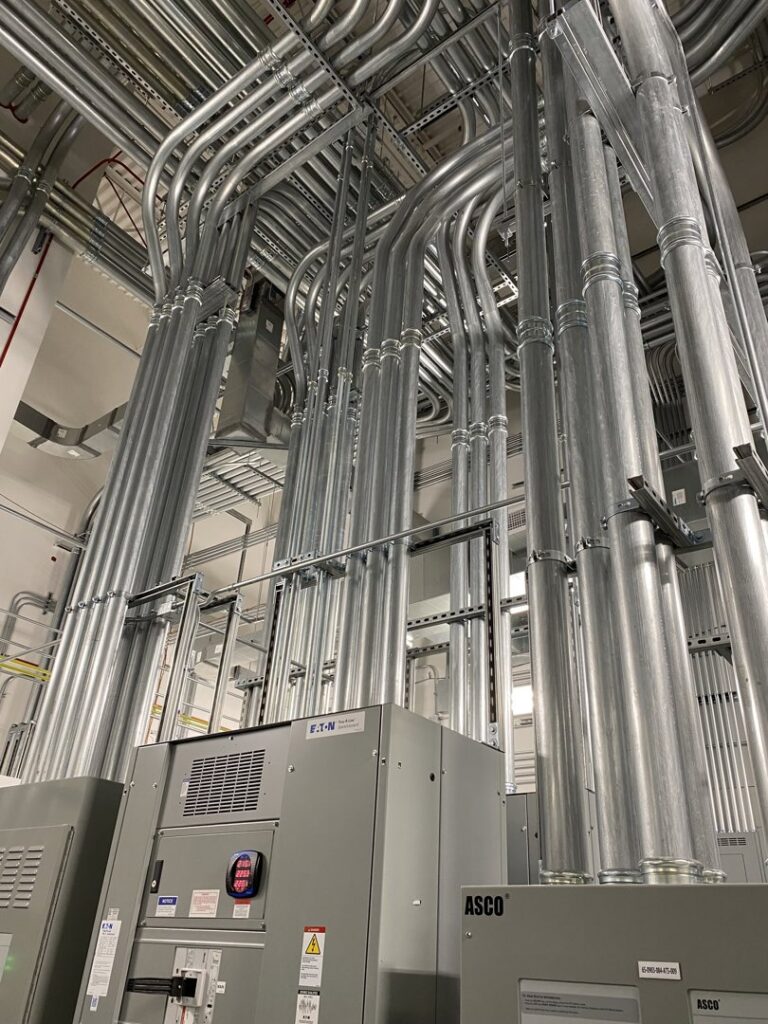 Intricate network of electrical conduits and control panels installed by IBEW Local 24 Membership Development in Baltimore, MD.