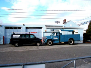 Service vehicles, including a bucket truck and van, for Line Electrical Contractors Inc. in Waterbury, CT