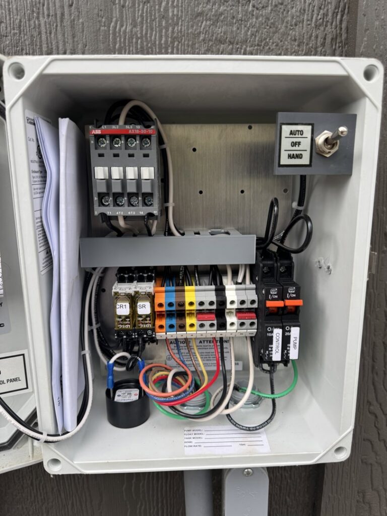 Detailed view of an electrical control panel with intricate wiring, serviced by McCurley Electric in Little Rock, AR.