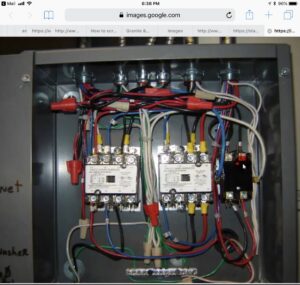 Electrical control panel with complex wiring and relays, installed by Wire That Up-Fire Suppression & Hood Electrical in Suffolk, VA.