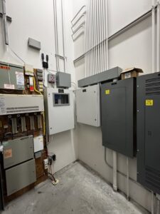 An electrical control room with multiple panels and conduits installed by kt_electricalcontractors in Spokane Valley, WA